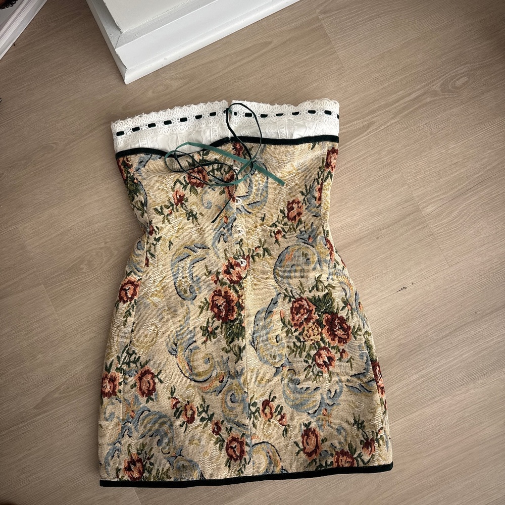 With Jean embroidered strapless dress.